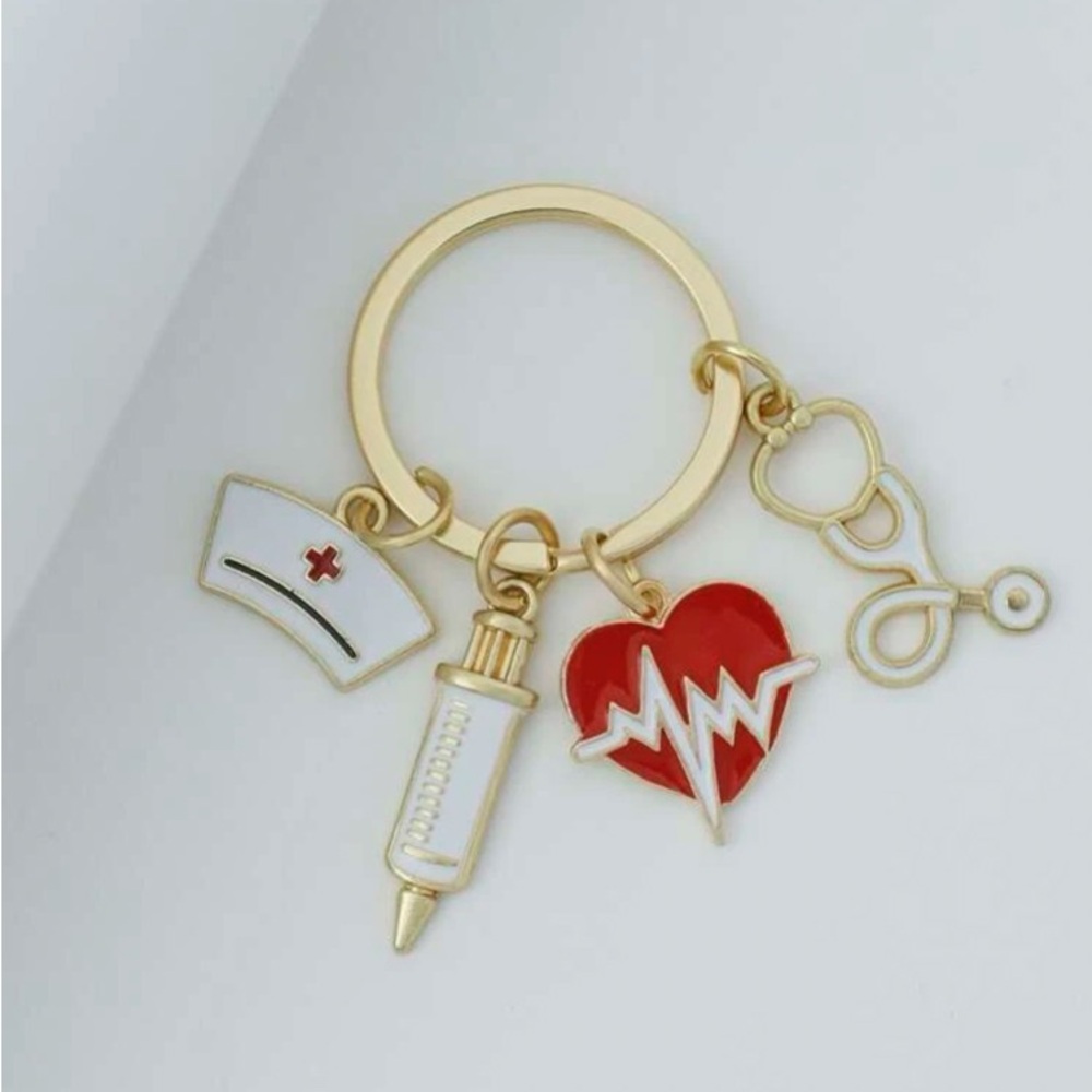 Keychain- Cute Womens Keychain with a nurses hat, stethoscope  needle  nwt